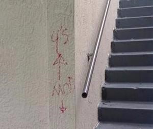 Graffiti directed customers where to go to buy their drug of choice