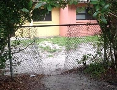 Hole in property fence to distribute drugs